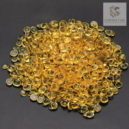 Yellow keratin glue granules for fusion hair extensions